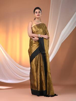Golden tissue soft saree with pompom 1