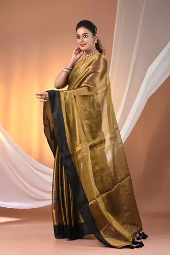 Golden tissue soft saree with pompom