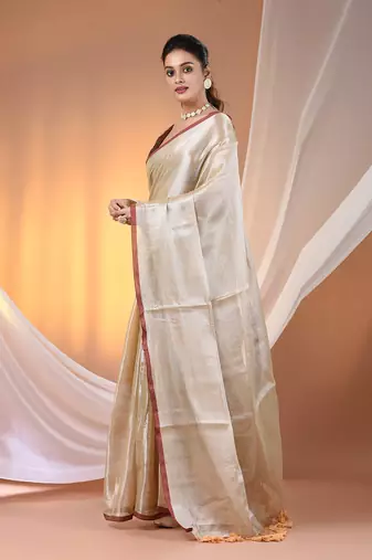 Beige tissue soft saree with pompom