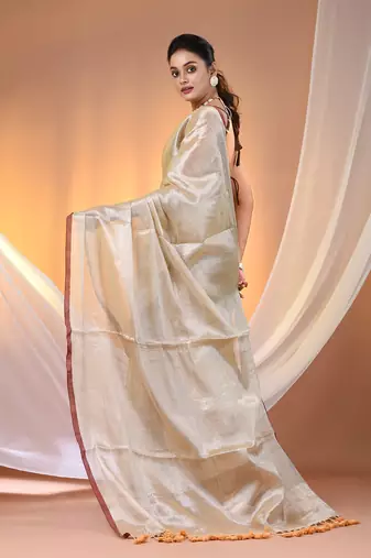 Beige tissue soft saree with pompom