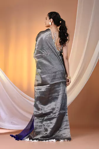 Grey and blue tissue soft saree with pompom