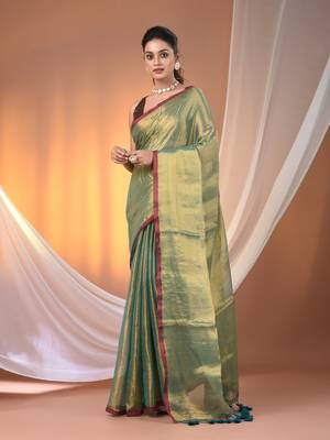 Teal tissue soft saree with pompom 1