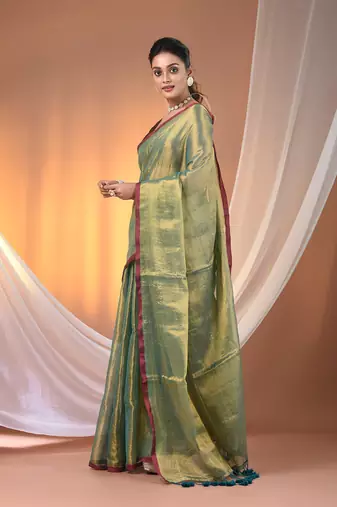 Teal tissue soft saree with pompom