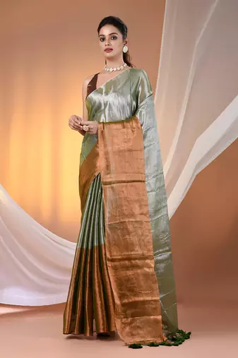 Green and golden tissue soft saree with pompom