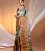 Green and golden tissue soft saree with pompom