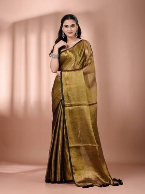 Golden tissue soft saree with pompom 1