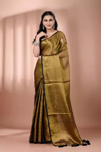 Golden tissue soft saree with pompom