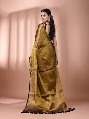 Golden tissue soft saree with pompom 3