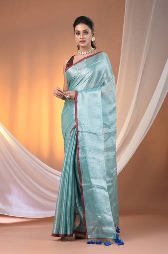 Aqua blue tissue soft saree with pompom