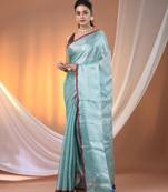 Aqua blue tissue soft saree with pompom