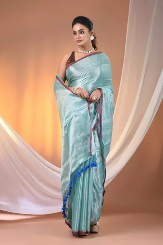 Aqua blue tissue soft saree with pompom
