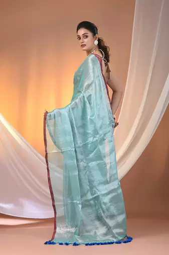 Aqua blue tissue soft saree with pompom