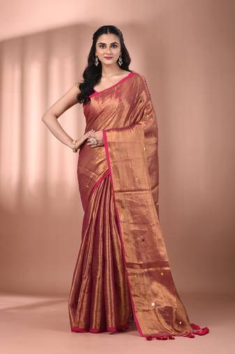 Magenta tissue soft saree with sequined work