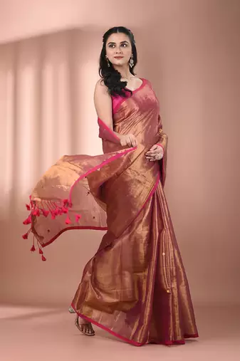 Magenta tissue soft saree with sequined work