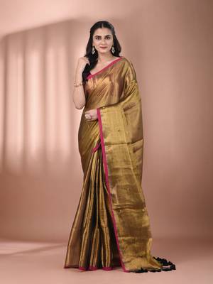 Golden tissue soft saree with sequined work 1