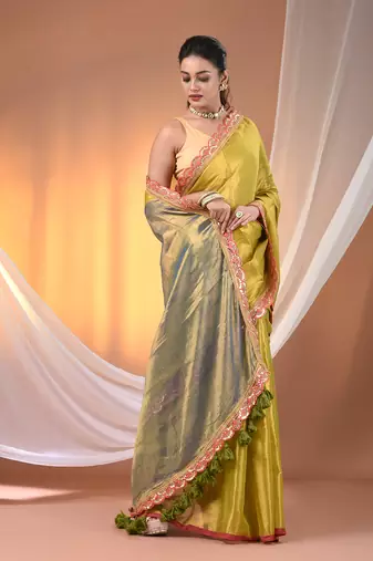 Lemon yellow and blue shimmer tissue saree with gota patti borders