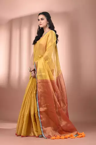 Yellow shimmer tissue saree with gota patti borders