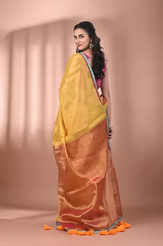 Yellow shimmer tissue saree with gota patti borders