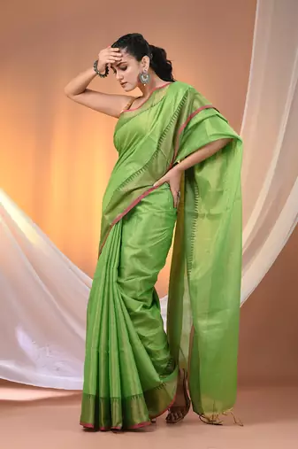Green tissue soft saree with zari borders