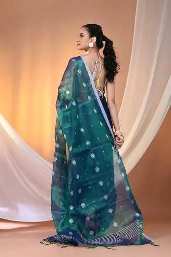 Peacock blue texture motifs tissue saree with stripes pallu