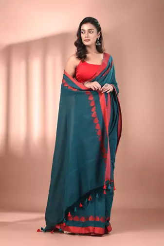 Teal cotton soft saree with woven heart borders
