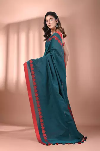 Teal cotton soft saree with woven heart borders