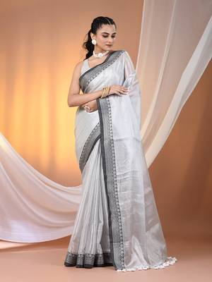 Silver shimmer tissue saree with nakshi borders 1