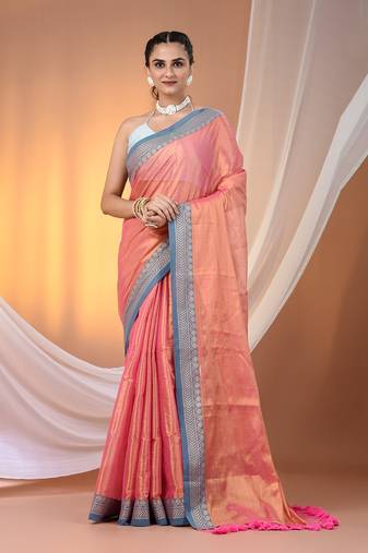 Peach shimmer tissue saree with nakshi borders
