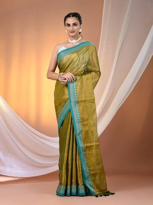 Sap green shimmer tissue saree with nakshi borders 1