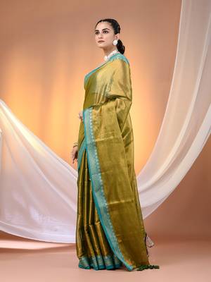 Sap green shimmer tissue saree with nakshi borders 2