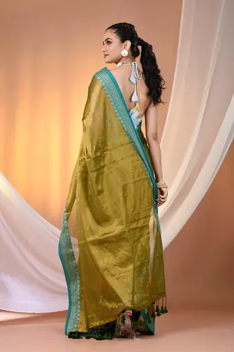 Sap green shimmer tissue saree with nakshi borders