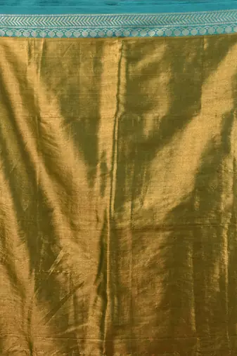 Sap green shimmer tissue saree with nakshi borders