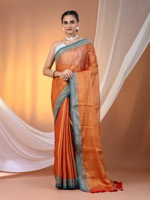 Orange shimmer tissue saree with nakshi borders 1