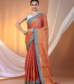 Red shimmer tissue saree with nakshi borders