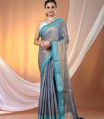 Blue shimmer tissue saree with nakshi borders