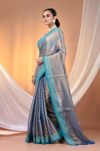 Blue shimmer tissue saree with nakshi borders