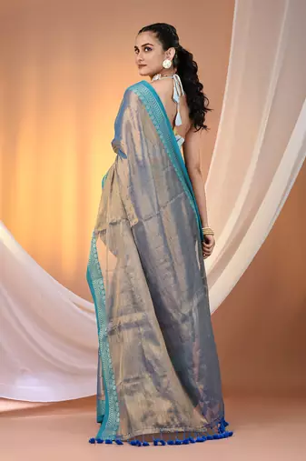 Blue shimmer tissue saree with nakshi borders