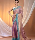 Violet shimmer tissue saree with nakshi borders
