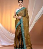 Copper shimmer tissue saree with nakshi borders