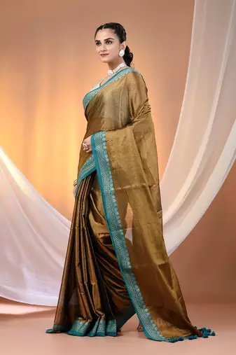 Copper shimmer tissue saree with nakshi borders