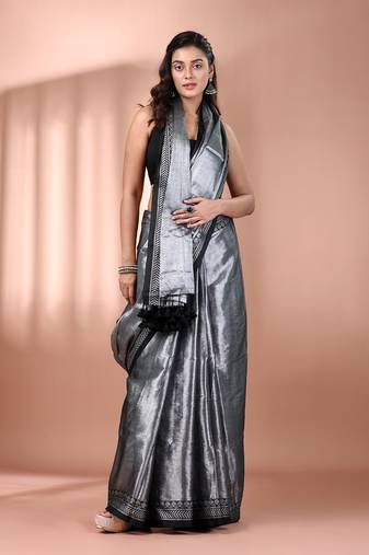 Silver shimmer tissue saree with nakshi borders