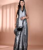 Silver shimmer tissue saree with nakshi borders