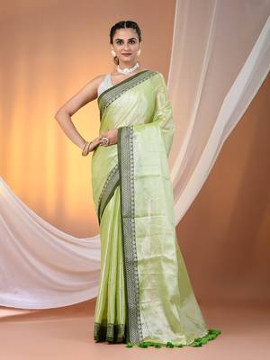 Light green shimmer tissue saree with nakshi borders 1