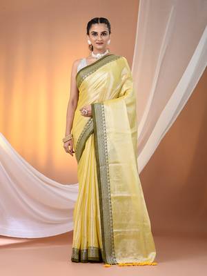 Yellow shimmer tissue saree with nakshi borders 1