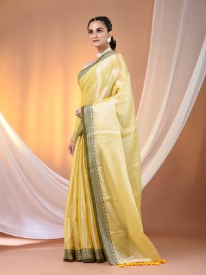 Yellow shimmer tissue saree with nakshi borders 2