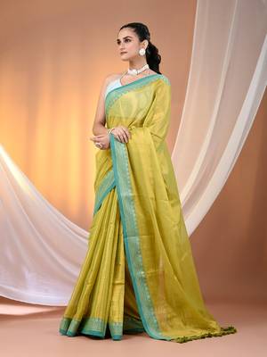 Lime green shimmer tissue saree with nakshi borders 2