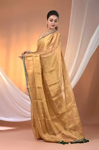 Beige shimmer tissue saree with gota patti borders