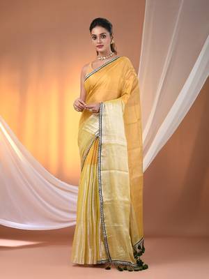 Yellow shimmer tissue saree with gota patti borders 1