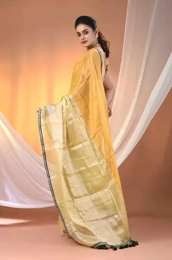 Yellow shimmer tissue saree with gota patti borders