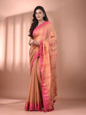 Beige tissue soft saree with temple borders 1